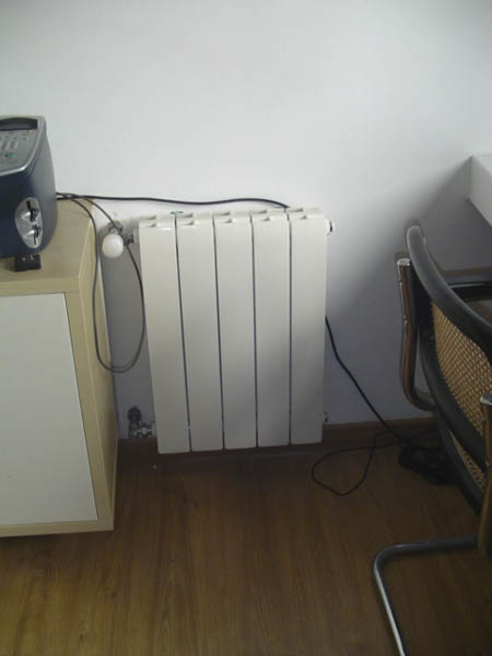 Radiador en habitación de cliente